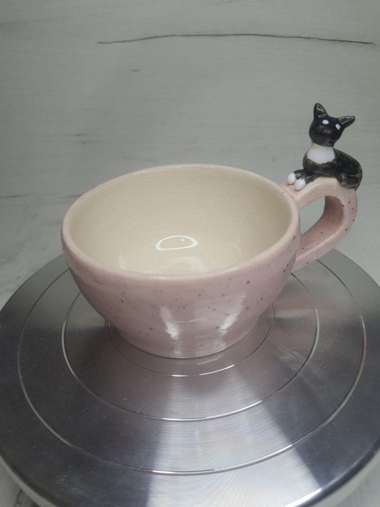 Cat dreams at pink dawn: handmade ceramic cup with black cat