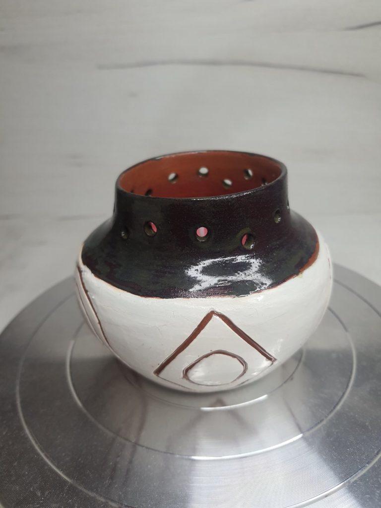“Breath of Protection” – a protective candle in a ceramic vessel with protective symbols and light perforations